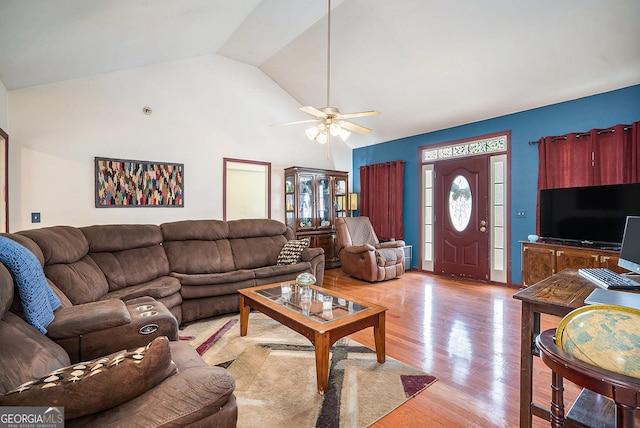 259 Hanover Cir SE, Calhoun, GA 30701 - living area with a ceiling fan, lofted ceiling, and light wood-style flooring