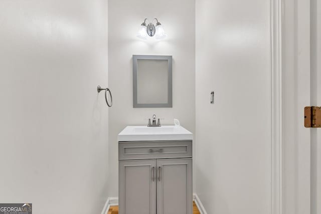 1186 Hawthorn Ln, Grayson, GA 30017 - bathroom featuring vanity and baseboards