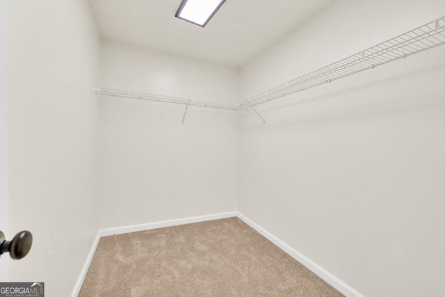 1186 Hawthorn Ln, Grayson, GA 30017 - spacious closet with carpet flooring