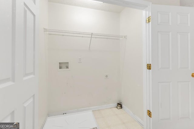 1186 Hawthorn Ln, Grayson, GA 30017 - washroom with washer hookup, hookup for an electric dryer, and tile patterned floors