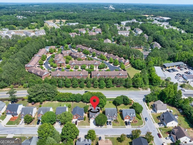 1186 Hawthorn Ln, Grayson, GA 30017 - aerial overview of property's location featuring nearby suburban area and a heavily wooded area