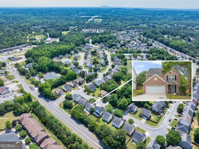 1186 Hawthorn Ln, Grayson, GA 30017 - aerial view of residential area with property parcel outlined and a forest
