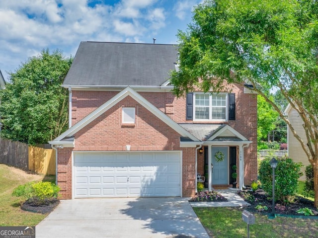 1186 Hawthorn Ln, Grayson, GA 30017 - traditional-style house featuring concrete driveway and brick siding