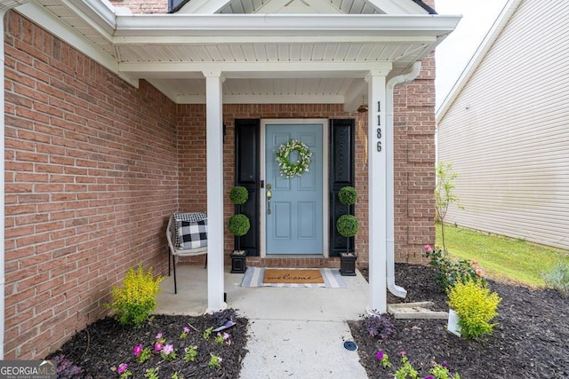 1186 Hawthorn Ln, Grayson, GA 30017 - view of exterior entry featuring brick siding