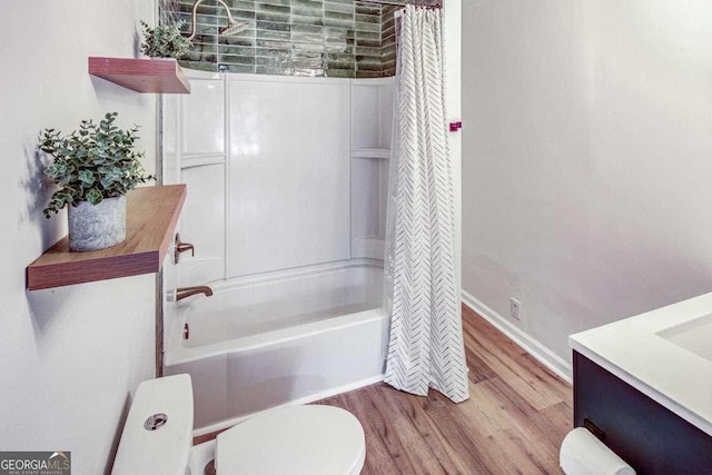 2572 Bates St SE, Smyrna, GA 30080 - full bath with toilet, wood finished floors, shower / bath combo, and vanity