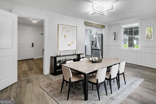 2572 Bates St SE, Smyrna, GA 30080 - dining area with wood finished floors and plenty of natural light