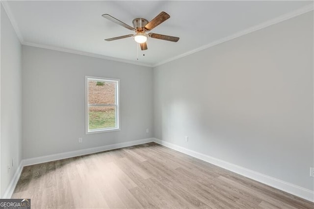 1226 Bloomsbury Ln, Gainesville, GA 30501 - empty room with wood finished floors, a ceiling fan, and crown molding