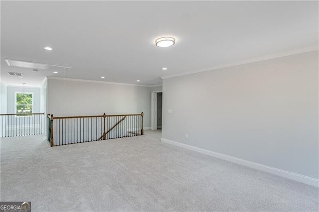 1226 Bloomsbury Ln, Gainesville, GA 30501 - unfurnished room with attic access, ornamental molding, recessed lighting, and light carpet