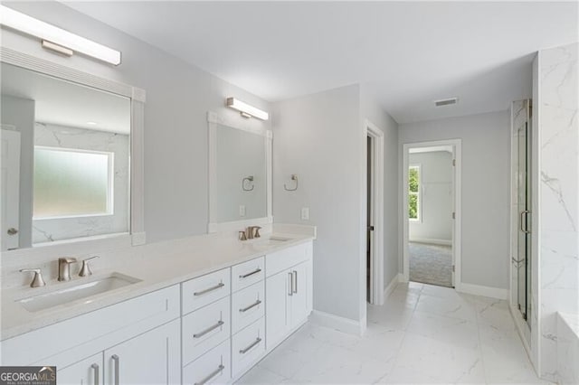 1226 Bloomsbury Ln, Gainesville, GA 30501 - bathroom featuring marble look tile flooring, double vanity, and a marble finish shower
