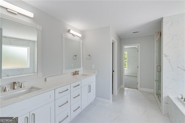 1226 Bloomsbury Ln, Gainesville, GA 30501 - full bathroom featuring marble finish floors, double vanity, a marble finish shower, and a tub with marble appearance