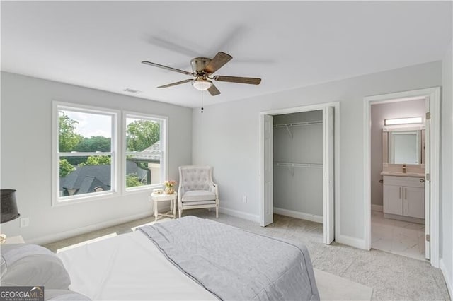 1226 Bloomsbury Ln, Gainesville, GA 30501 - bedroom featuring light colored carpet, a closet, ceiling fan, and ensuite bathroom