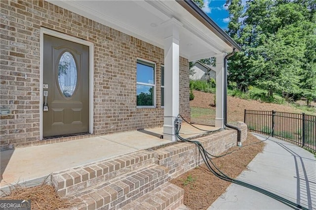 1226 Bloomsbury Ln, Gainesville, GA 30501 - view of exterior entry with covered porch and brick siding