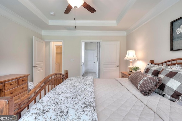 1391 Crooked Creek Rd, Greensboro, GA 30642 - bedroom featuring a tray ceiling, ornamental molding, ensuite bathroom, and ceiling fan