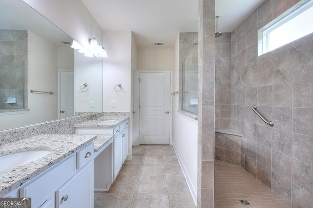 1391 Crooked Creek Rd, Greensboro, GA 30642 - full bath with walk in shower, two vanities, and tile patterned flooring