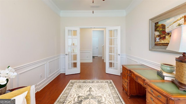 1391 Crooked Creek Rd, Greensboro, GA 30642 - hallway featuring french doors, ornamental molding, dark wood finished floors, a wainscoted wall, and a decorative wall
