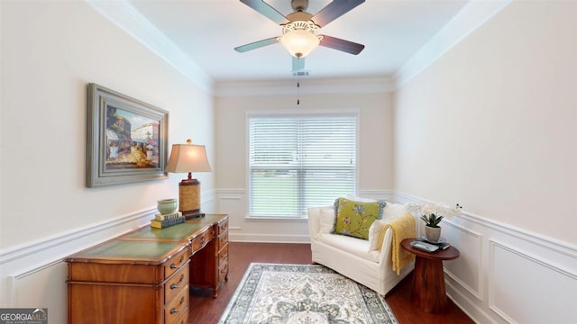 1391 Crooked Creek Rd, Greensboro, GA 30642 - living area featuring dark wood-style floors, wainscoting, crown molding, a ceiling fan, and a decorative wall