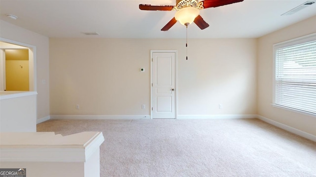 1391 Crooked Creek Rd, Greensboro, GA 30642 - spare room with a ceiling fan, light colored carpet, a smoke detector, and baseboards