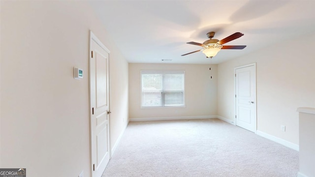 1391 Crooked Creek Rd, Greensboro, GA 30642 - unfurnished room with ceiling fan, light colored carpet, and baseboards