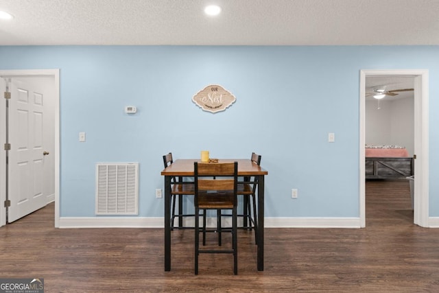 825 Red Hawk Dr, Waynesville, GA 31566 - dining area with wood finished floors, recessed lighting, ceiling fan, and a textured ceiling