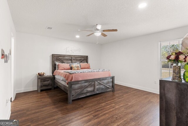 825 Red Hawk Dr, Waynesville, GA 31566 - bedroom featuring wood finished floors, recessed lighting, a textured ceiling, and ceiling fan