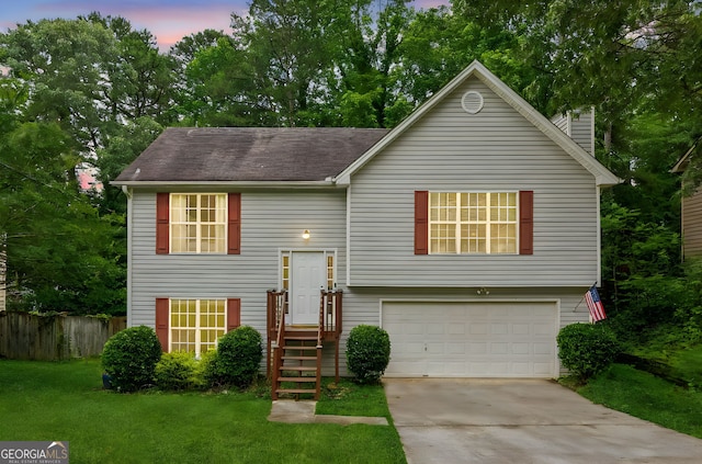 5519 Princeton Oaks Ln, Sugar Hill, GA 30518 - split foyer home featuring an attached garage, concrete driveway, a chimney, and a shingled roof