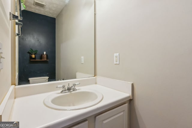 5519 Princeton Oaks Ln, Sugar Hill, GA 30518 - bathroom featuring vanity and toilet