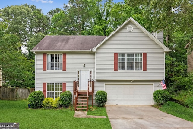 5519 Princeton Oaks Ln, Sugar Hill, GA 30518 - split foyer home featuring a garage, driveway, a chimney, and roof with shingles