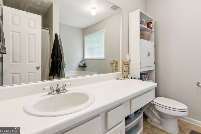 5519 Princeton Oaks Ln, Sugar Hill, GA 30518 - full bathroom with vanity, toilet, tile patterned floors, and curtained shower
