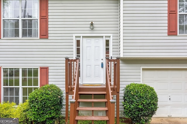 5519 Princeton Oaks Ln, Sugar Hill, GA 30518 - doorway to property featuring an attached garage