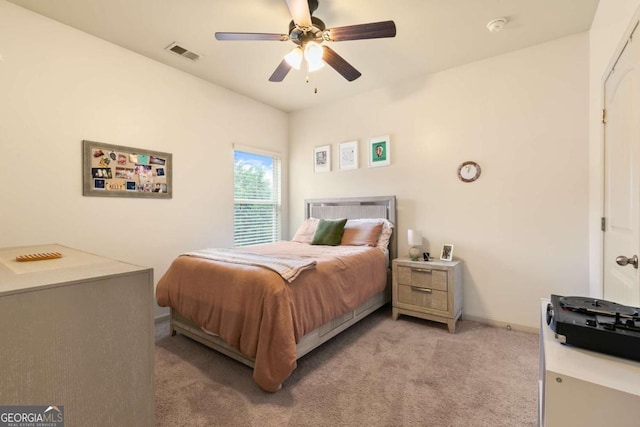 106 Cessna Dr, Canton, GA 30114 - bedroom with light colored carpet, ceiling fan, and baseboards