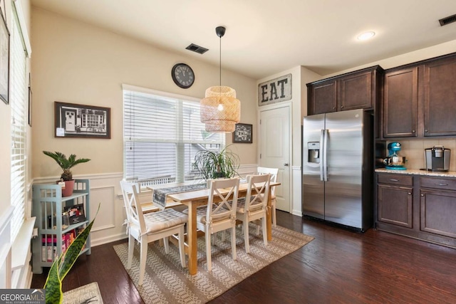 106 Cessna Dr, Canton, GA 30114 - dining space featuring wainscoting, dark wood-style floors, a decorative wall, and recessed lighting