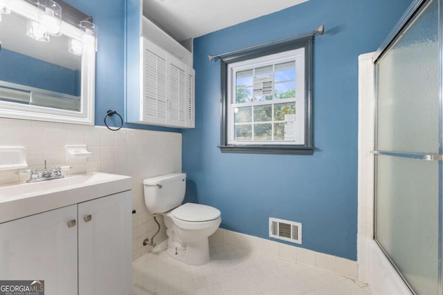 3664 Pin Oak Cir, Atlanta, GA 30340 - full bathroom featuring vanity, tile patterned floors, and shower / bath combination with glass door