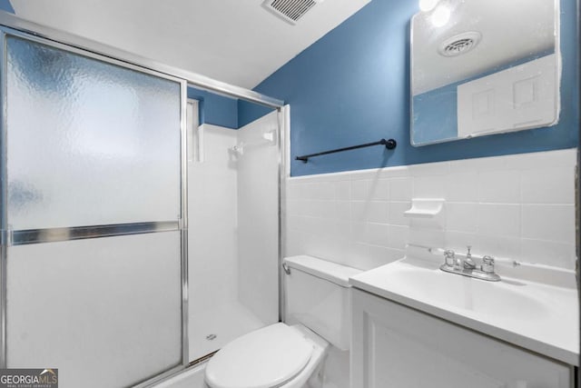 3664 Pin Oak Cir, Atlanta, GA 30340 - bathroom featuring vanity, a stall shower, and tile walls