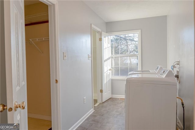 726 Mcdaniel Mill Rd SW, Conyers, GA 30094 - washroom featuring washing machine and dryer and baseboards