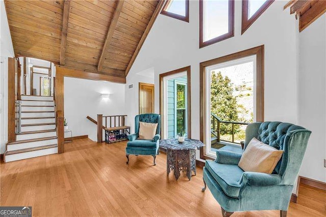 10845 Shallowford Rd, Roswell, GA 30075 - living area with high vaulted ceiling, wood finished floors, and a wood ceiling with exposed beams