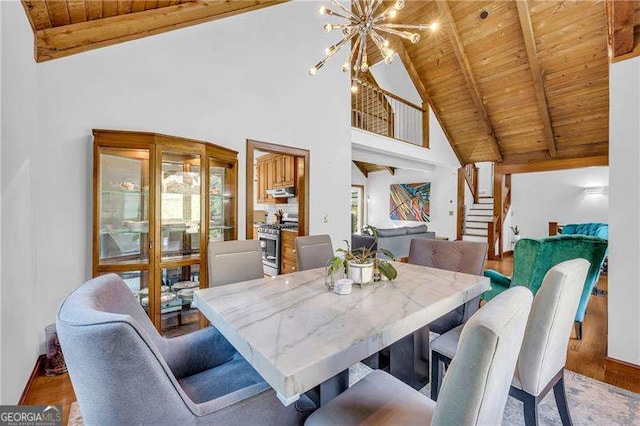 10845 Shallowford Rd, Roswell, GA 30075 - dining space featuring a wood ceiling with exposed beams, wood finished floors, stairway, a chandelier, and high vaulted ceiling