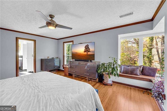 10845 Shallowford Rd, Roswell, GA 30075 - bedroom featuring wood finished floors, a ceiling fan, and a textured ceiling