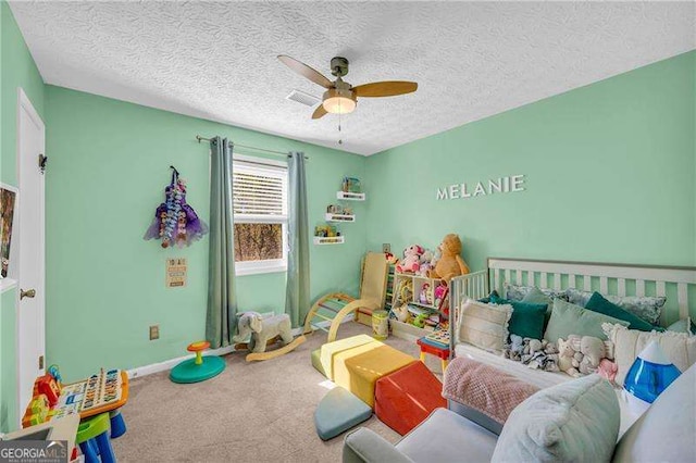 10845 Shallowford Rd, Roswell, GA 30075 - carpeted bedroom featuring a textured ceiling and a ceiling fan