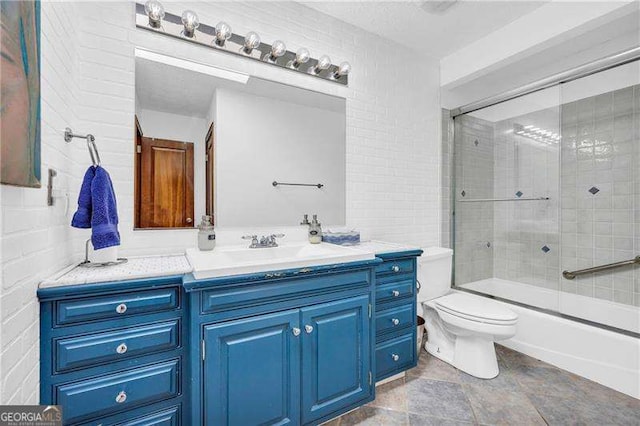 10845 Shallowford Rd, Roswell, GA 30075 - bathroom with vanity and bath / shower combo with glass door