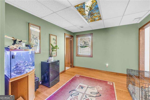 10845 Shallowford Rd, Roswell, GA 30075 - interior space with a drop ceiling and wood finished floors