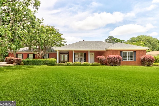 101 Coldbrook Cir, Rincon, GA 31326 - ranch-style home featuring a front lawn and brick siding