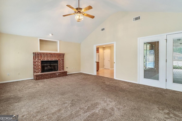 101 Coldbrook Cir, Rincon, GA 31326 - unfurnished living room featuring a ceiling fan, carpet flooring, high vaulted ceiling, and a fireplace