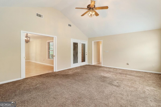 101 Coldbrook Cir, Rincon, GA 31326 - unfurnished living room with high vaulted ceiling, carpet flooring, and ceiling fan