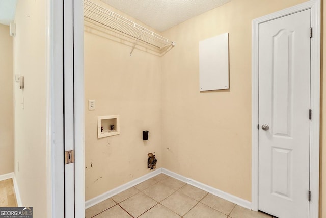 101 Coldbrook Cir, Rincon, GA 31326 - laundry area with hookup for a washing machine, hookup for an electric dryer, and light tile patterned floors