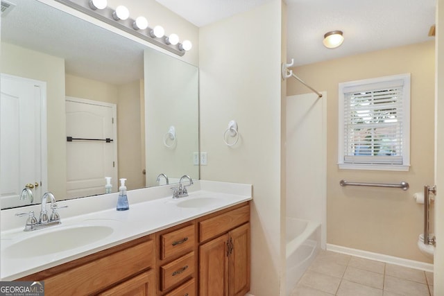 101 Coldbrook Cir, Rincon, GA 31326 - full bathroom featuring tile patterned floors, double vanity, and washtub / shower combination