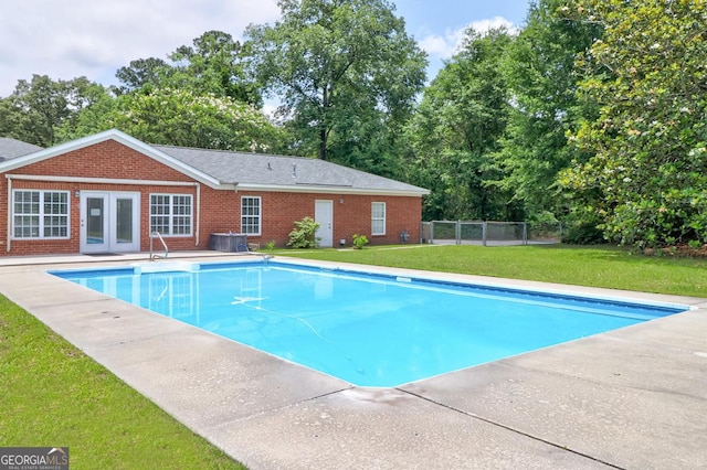 101 Coldbrook Cir, Rincon, GA 31326 - swimming pool with french doors and view of scattered trees