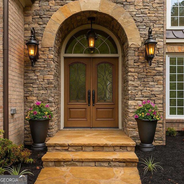 5705 Registry Oaks Ln SE, Mableton, GA 30126 - doorway to property featuring stone siding and french doors