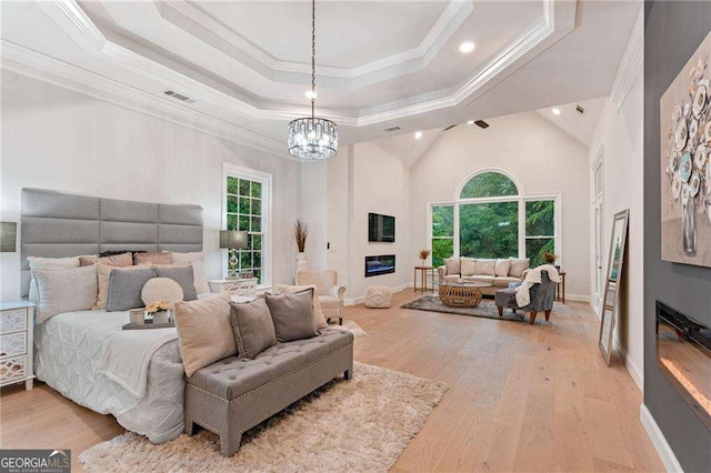 5705 Registry Oaks Ln SE, Mableton, GA 30126 - bedroom with ornamental molding, multiple windows, a chandelier, light wood finished floors, and recessed lighting