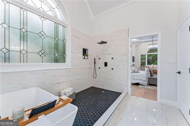 5705 Registry Oaks Ln SE, Mableton, GA 30126 - bathroom with crown molding, marble tiled floors, a marble finish shower, ensuite bathroom, and a freestanding bath