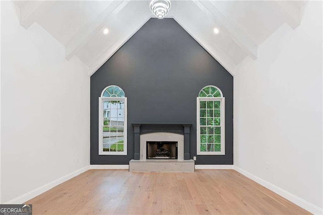 5705 Registry Oaks Ln SE, Mableton, GA 30126 - unfurnished living room featuring high vaulted ceiling, beamed ceiling, wood finished floors, recessed lighting, and baseboards